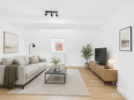 Helle Dachgeschosswohnung mit Möglichkeit zur Maisonette in bester Lage von Lauf an der Pegnitz - Wohnzimmer_KI generiert