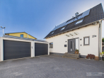 Neuwertiges Haus mit KfW-55-Gebäudehülle, 205 m² Wohn-/Nutzfläche & Traumgarten in Rückersdorf - Außenansicht