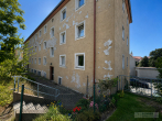 Investmentchance in Tirschenreuth: 18 Wohneinheiten mit Sanierungsbedarf und Entwicklungspotenzial - Haus Rückseite