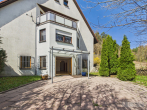 Stilvolle 3-Zimmer-Wohnung mit großzügiger Terrasse und lichtdurchflutetem Wohnkonzept - Terrasse mit Gartenbereich