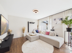 Attraktives Einfamilienhaus in Richtheim – Modern, hochwertig und energieeffizient - Wohnzimmer_