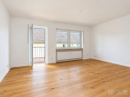 Hochwertige 3-Zimmer-Wohnung mit Südbalkon in Feldkirchen bei München - Wohnzimmer