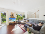 Gepflegte Doppelhaushälfte mit Garten und umfangreichen Modernisierungen in Nürnberg-Ost - Wohnzimmer_EG